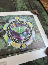 Load image into Gallery viewer, Alternate angle to show shine - 8x8" reproduction giclée print of Galaxy Luna with a 1.25" deckled edge border