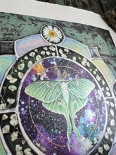 Load image into Gallery viewer, Alternate view/angle to show shine - 8x8" reproduction giclée print of Galaxy Luna with a 1.25" deckled edge border