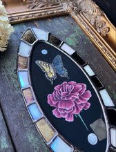 Load image into Gallery viewer, Full photo- bilateral gynandromorph swallowtail with pink carnations gouache painting encased in glass with bronze/black and white/opal checkered border.