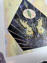 Load image into Gallery viewer, Angled left bottom side to show shine - Swallowtail Life cycle depicts full grown swallowtail, larvae, and cocoon in vertical row. Blue/purple and metallic hand dyed background in geometrical shape (pointed top, angled sides, flat bottom). Artwork is on yellow iridescent glass to mimic original piece. 8x10&quot; reproduction giclée print of Swallowtail Life Cycle with a 1.25&quot; deckled edge border
