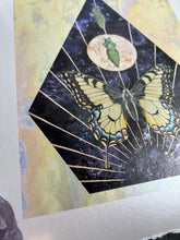 Load image into Gallery viewer, Angled left bottom side to show shine - Swallowtail Life cycle depicts full grown swallowtail, larvae, and cocoon in vertical row. Blue/purple and metallic hand dyed background in geometrical shape (pointed top, angled sides, flat bottom). Artwork is on yellow iridescent glass to mimic original piece. 8x10" reproduction giclée print of Swallowtail Life Cycle with a 1.25" deckled edge border