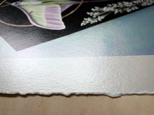 Load image into Gallery viewer, Side view of print to show deckled edge on paper.