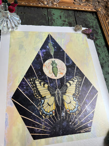 Alternate angle  to show metallic shine -Swallowtail Life cycle depicts full grown swallowtail, larvae, and cocoon in vertical row. Blue/purple and metallic hand dyed background in geometrical shape (pointed top, angled sides, flat bottom). Artwork is on yellow iridescent glass to mimic original piece. 11x14" reproduction giclée print of Swallowtail Life Cycle with a 1.25" deckled edge border 