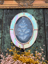 Load image into Gallery viewer, Full view, zoomed out. Blue oyster mushroom gouache painting on black. Oval shaped glass hanging wall art with oval rainbow iridized glass border and chain
