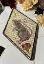Load image into Gallery viewer, Alternate view - Painted brown mouse and golden stars. Diamond shape. Gouache and gilding paint on vintage book page in beveled glass.

